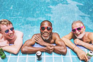 Group,Of,Diverse,Senior,Men,Enjoying,The,Pool,Together